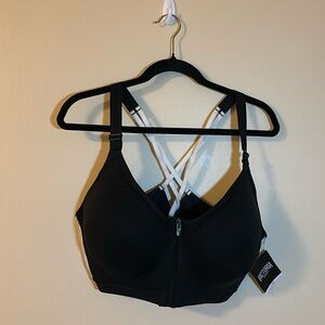 Black and silver front zip close sports bra with criss-cross back